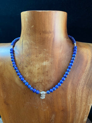 Lapis lazuli bead and silver pendant necklace. Natural lapis and sterling silver or higher grade.