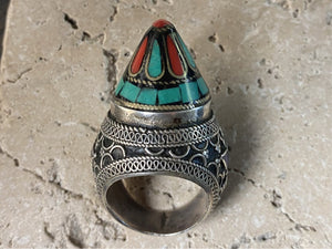 A heavy and substantial vintage ring from Turkmenistan. Sterling silver, turquoise and coral inlay, mid 20th century, size 9.25