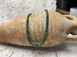 Stunning natural emerald necklace of perfectly drilled and graduated cabochon cut African emeralds finished with a sterling silver hook clasp. Not dyed or heat treated. Premium stringing on jeweller's monofilament. Length 44 cm, 52.6 Ct.