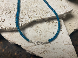 Apatite bead necklace featuring natural cabochon apatite beads graduated and finished with a sterling silver lobster clasp. This is simply stunning and a lovely statement necklace that matches any skin tone or clothing choice. 45 cm length