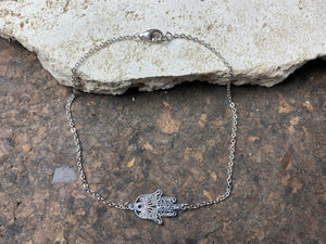 Hamsa anklet features a hamsa pendant on a fine chain and is made from a non-allergenic white metal that looks exactly like silver and will not ever tarnish, rust or wear
