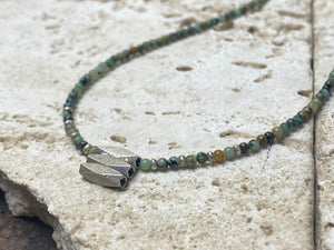 Very fine stone women or mens necklace made from tiny Ethiopian opal beads, highlighted with Karen silver "eye beads" and tribal pendant. The effect is simple, understated and stunning. Finished with sterling silver findings and clasp. A unisex necklace. Length 46.5 cm (18.35")