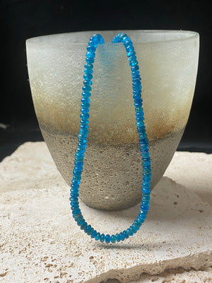 Apatite bead necklace featuring natural cabochon apatite beads graduated and finished with a sterling silver lobster clasp. This is simply stunning and a lovely statement necklace that matches any skin tone or clothing choice. 45 cm length