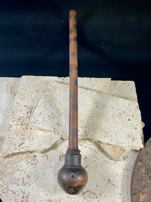A typical village opium pipe, used by a number of hill tribe people within the Golden Triangle of southeast Asia. This is most likely Hmong. Bamboo shaft, earthenware smoking bowl. Metal tool used to apply opium is original to the pipe. Early 20th century. In good condition with no cracks or repairs. Total length 36 cm (14.25")