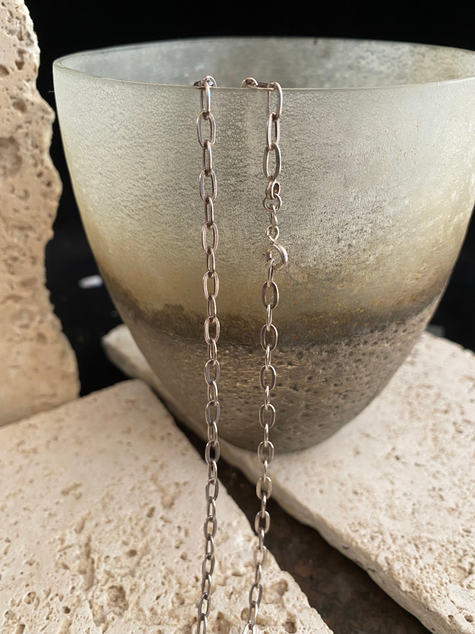 Elegant, open link chain featuring flat, oval links. Crafted from sterling silver and finished with a ring clasp.  Length 80 cm/31.5"