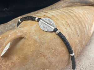 One of our signature coconut silver bracelets, crafted from polished coconut wood and hill tribe 95% silver A women's bracelet or a men's bracelet, it has a casual Boho vibe, and is made for that stacked bracelet look. Different sizes available