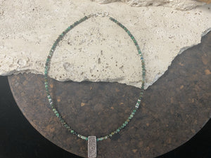 Contemporary necklace of round natural African turquoise, highlighted with sterling silver beads, a vintage Indian filigree silver pendant and sterling silver findings and clasp. Length 43.5 cm (17.25”), pendant 2.2 cm (1")