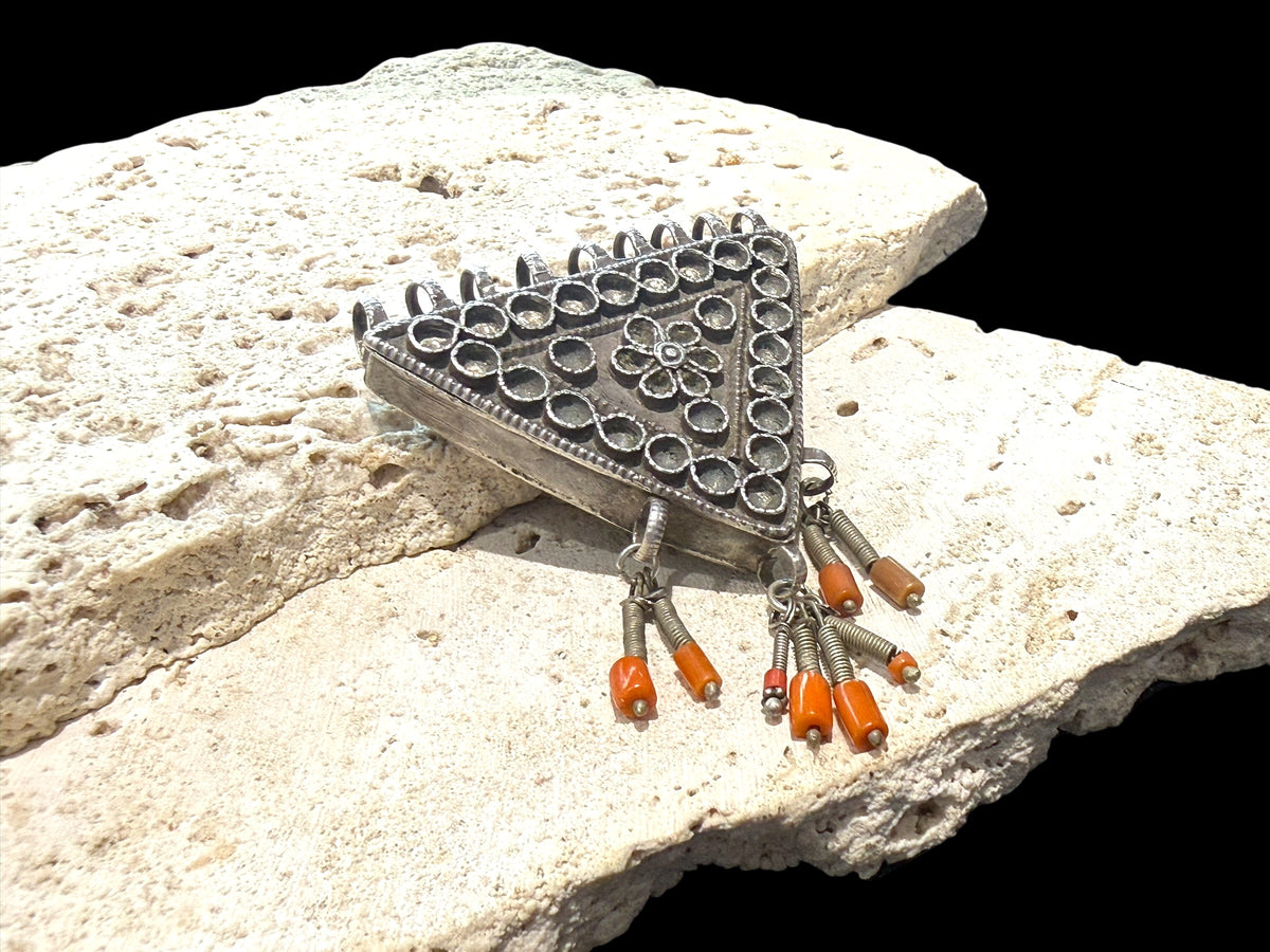 Vintage Afghani triangle protective amulet with Turkoman influence, high grade silver, red coral tipped dangles. Mid 20th C. Height 7.8 cm