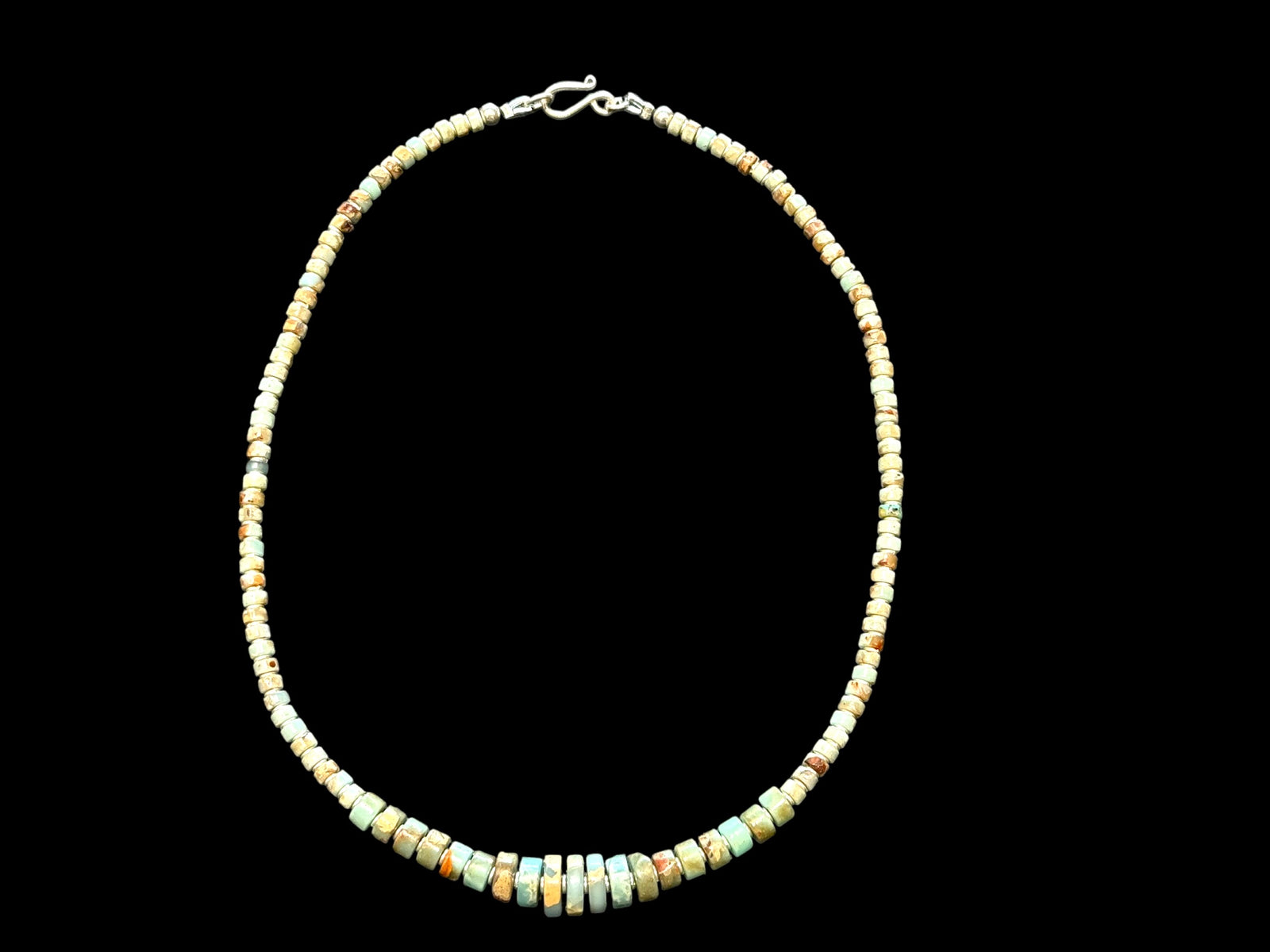 Choker necklace of graduated heshi cut pale blue amzonite, separated by sterling spacers. Sterling silver clasp. 42.5 cm length, beads 3-9 mm diameter