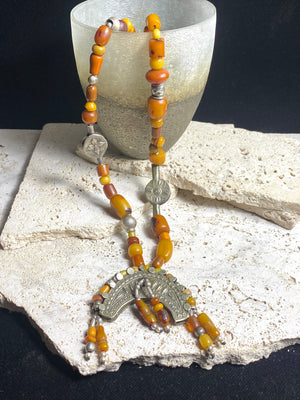 Antique Afghan prayer bead necklace with antique Tibetan silver pendant as centrepiece, plus antique Uzbek and old tribal silver beads. Length 61.5 cm