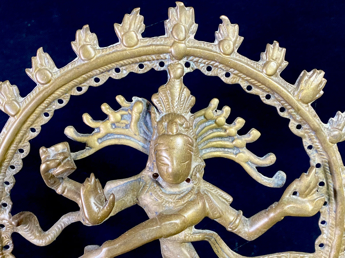 Antique midsized bronze Shiva Nataraj statue from southern India.  Cast from solid bronze, this is an older statue dating to at least the late 19th century. Height 24 cm