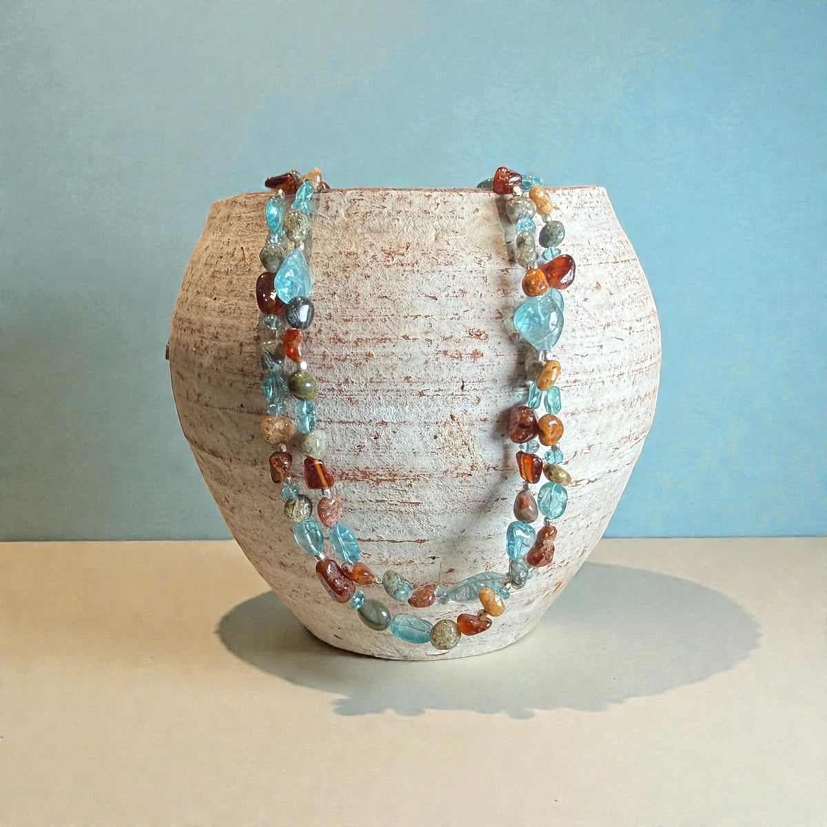 Stylish boho necklace made from two strands of pebble ocean jasper, apatite, hessonite garnet and sterling silver. Length 43.6 cm