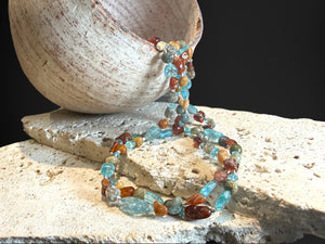 Stylish boho necklace made from two strands of pebble ocean jasper, apatite, hessonite garnet and sterling silver. Length 43.6 cm