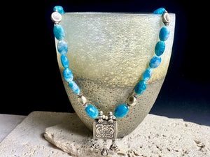 Apatite necklace featuring graduated natural blue apatite beads highlighted with old Indian silver beads and box pendant. Length 50 cm (19.75")