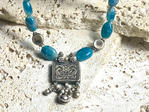 Apatite necklace featuring graduated natural blue apatite beads highlighted with old Indian silver beads and box pendant. Length 50 cm (19.75")