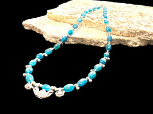 Deep blue apatite beads meet vintage Indian silver. Boulder-cut stones graduated and highlighted with silver accents, sterling silver hook clasp. Length 52 cm