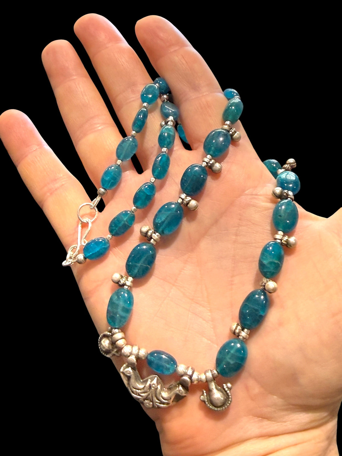 Deep blue apatite beads meet vintage Indian silver. Boulder-cut stones graduated and highlighted with silver accents, sterling silver hook clasp. Length 52 cm