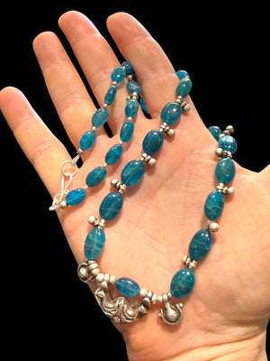 Deep blue apatite beads meet vintage Indian silver. Boulder-cut stones graduated and highlighted with silver accents, sterling silver hook clasp. Length 52 cm