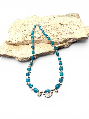Deep blue apatite beads meet vintage Indian silver. Boulder-cut stones graduated and highlighted with silver accents, sterling silver hook clasp. Length 52 cm