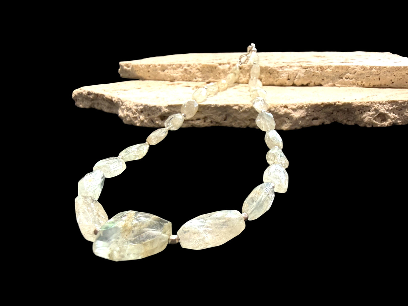 Aquamarine choker. The stones are a pale white-yellow-green and the necklace features silver bead detailing. Sterling silver hook and findings. 40.7 cm length