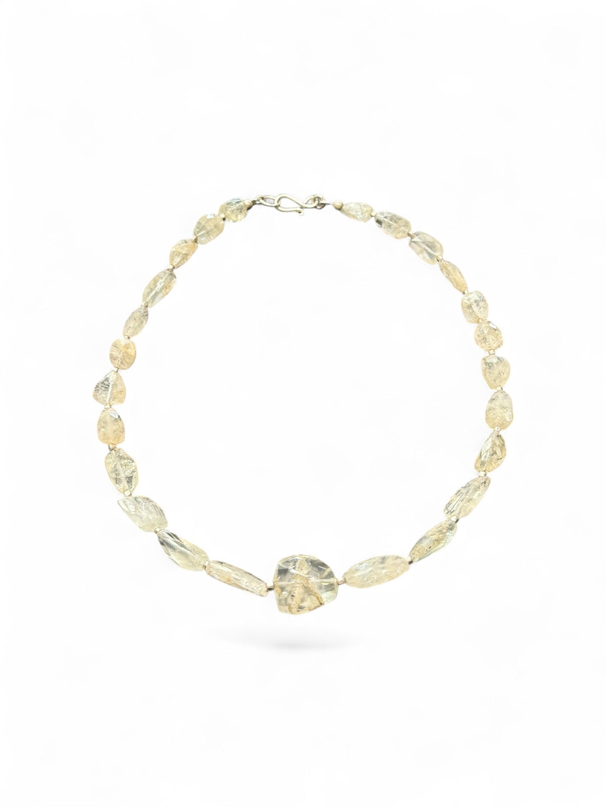 Aquamarine choker. The stones are a pale white-yellow-green and the necklace features silver bead detailing. Sterling silver hook and findings. 40.7 cm length