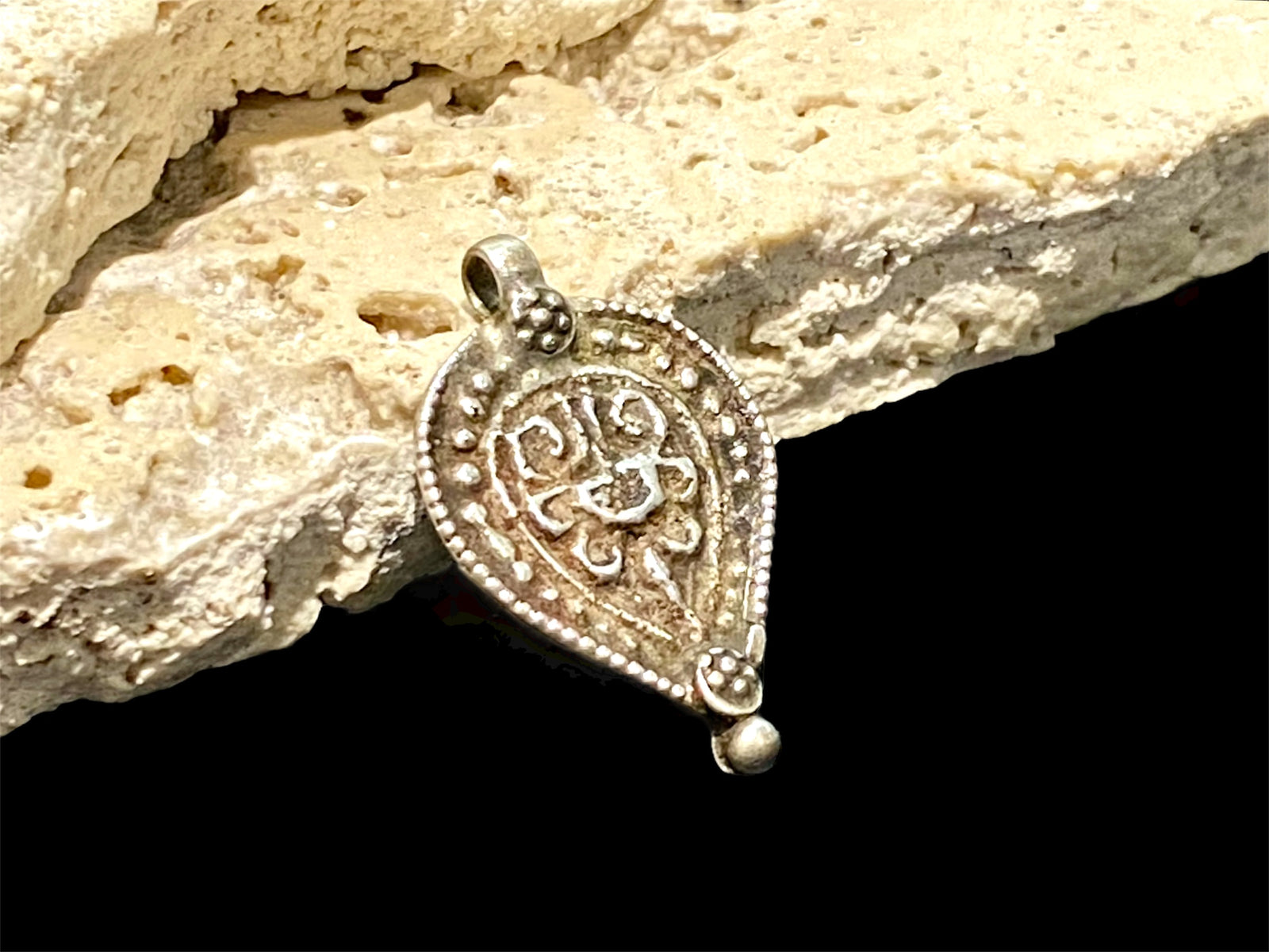 Aramudi pendant, silver, southern India. Protective, represents the power of women. Mid 20th C. Measurements: height 3 cm, width 2 cm