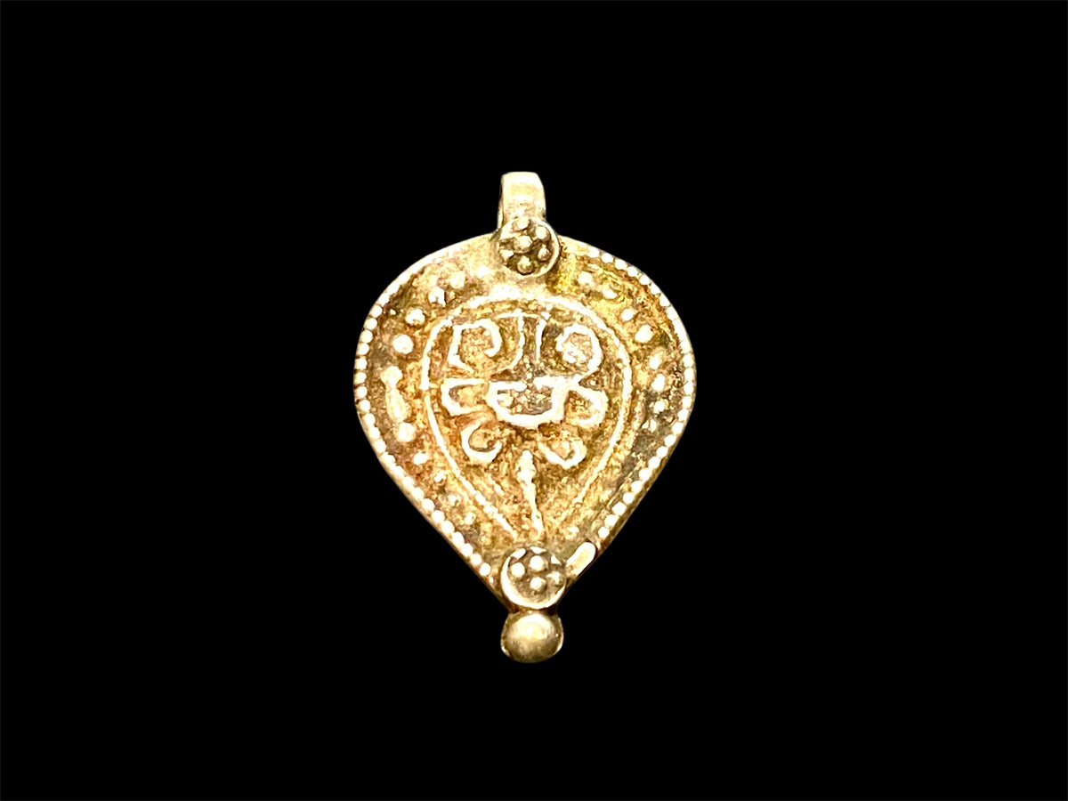 Aramudi pendant, silver, southern India. Protective, represents the power of women. Mid 20th C. Measurements: height 3 cm, width 2 cm