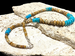 Southwest style necklace of graduated Arizonian turquoise & rondel cut jasper beads. The necklace is finished with a sterling silver hook clasp. Length 45.5 cm