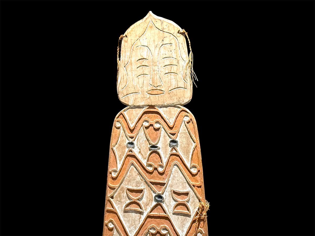 Asmat shield. Wood carved and decorated with lime, ochre, charcoal and sago fibre. Central Asmat region, Irian Jaya. Length 166 cm x 42 cm. Yartzhaus Collection