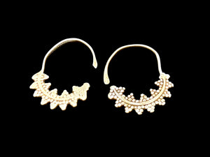 Berber hoop earrings with ornamented crescent edged with trefoil projections. High grade silver. Tunisia. Early 20th C or earlier. Width 3 cm, height 4.2 cm