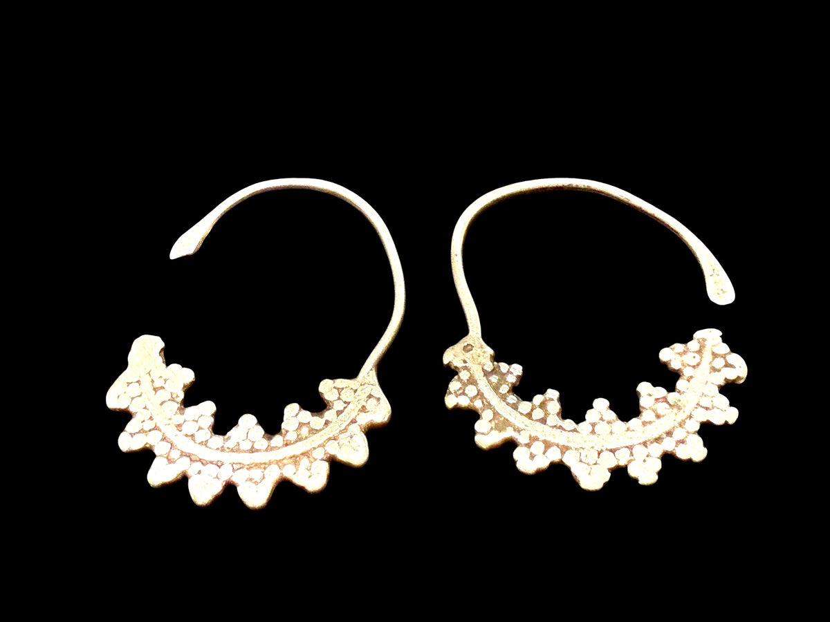 Berber hoop earrings with ornamented crescent edged with trefoil projections. High grade silver. Tunisia. Early 20th C or earlier. Width 3 cm, height 4.2 cm