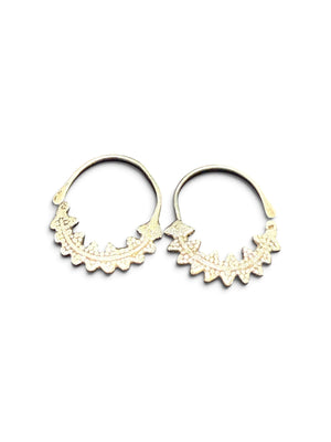 Berber open hoop earrings with ornamented crescent edged with trefoil projections. High grade silver. Tunisia. Early 20th C. Height 4.1 cm, width 3.7 cm