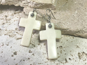 Stylish cross earrings with a southwest vibe. Hand carved cow bone, sterling silver detailing and hooks. Light and easy to wear. Drop including hook 6.5 cm