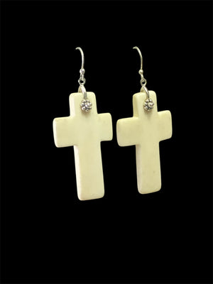 Stylish cross earrings with a southwest vibe. Hand carved cow bone, sterling silver detailing and hooks. Light and easy to wear. Drop including hook 6.5 cm