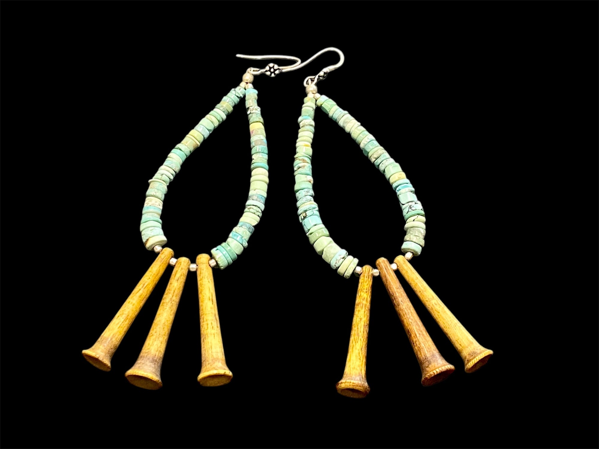 Graduated unpolished heshi-cut turquoise and vintage Naga deer antler pendants. Sterling silver detailing. Very long earrings, tribally inspired. Length 12 cm