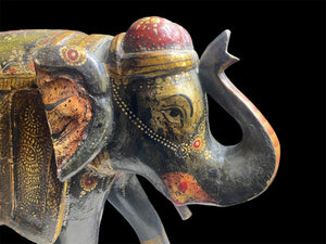 Very large vintage elephant, hand painted in rich detail, crafted in India from solid hard wood. Height 25.5, length 35 cm, depth 14 cm
