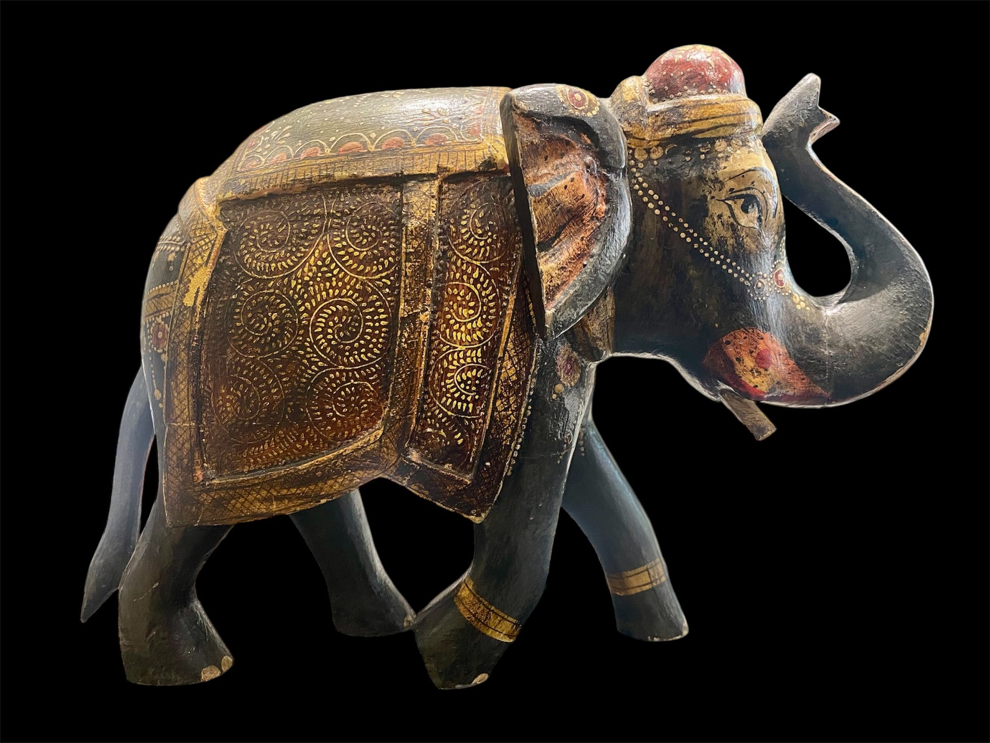 Very large vintage elephant, hand painted in rich detail, crafted in India from solid hard wood. Height 25.5, length 35 cm, depth 14 cm
