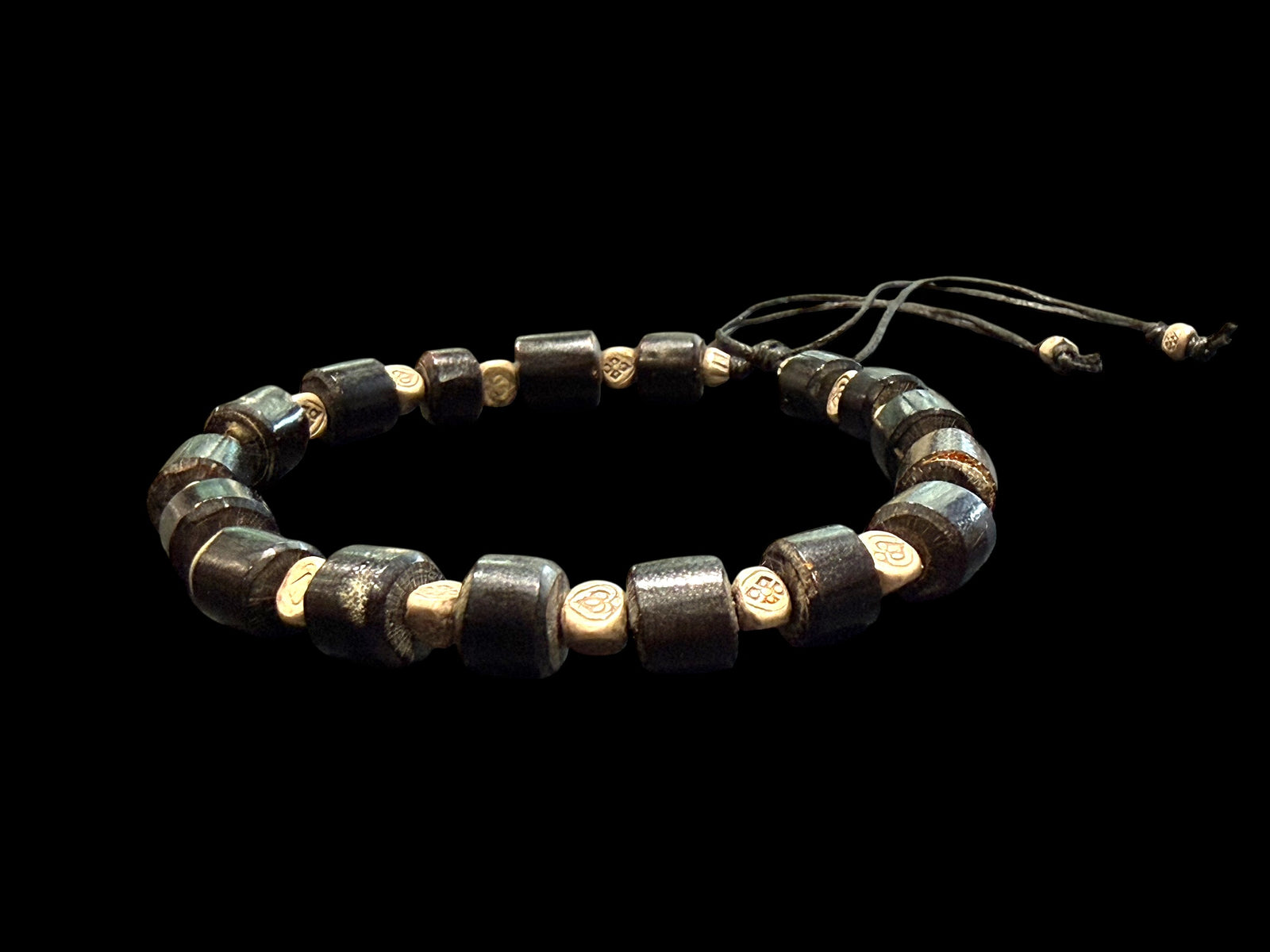 Stunning bracelet featuring antique black coral and Karen hill tribe silver. Strung on waxed cord, large & adjustable and unisex. Size 20 cm or larger