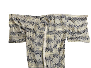 Vintage man or woman's  full length Japanese kimono dateing to the 1950s. Silk, hand stitched. Blue black geometric pattern on a cream background.