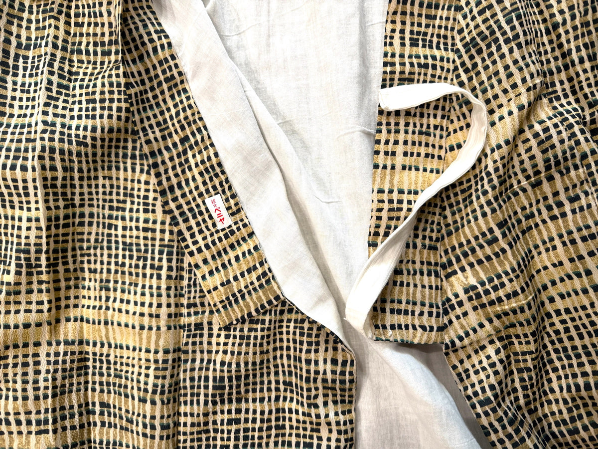 Vintage 1960's Japanese kimono, silk with cotton lining, geometric blue pattern ona cream background. Near mint condition.