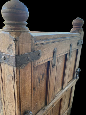 Originally a dowry chest & converted into a box seat many decades ago. Storage is available in the lower part. Four wheels and two iron rings mean that this item can be easily moved around and repositioned. Teak & rosewood, early 20th century, Southern India. Height 105 cm at highest point, length 150 cm, depth 74 cm