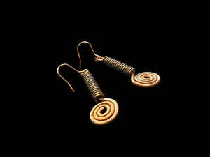 Beautifully organic earrings made from handmade bronze beads from Nagaland and copper. The hooks are made of solid brass. Length 5.5 cm