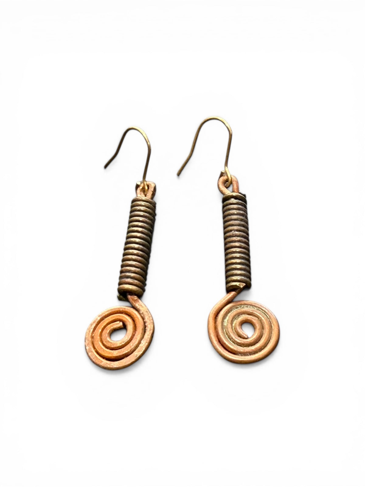 Beautifully organic earrings made from handmade bronze beads from Nagaland and copper. The hooks are made of solid brass. Length 5.5 cm