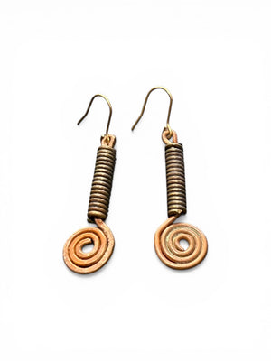 Beautifully organic earrings made from handmade bronze beads from Nagaland and copper. The hooks are made of solid brass. Length 5.5 cm