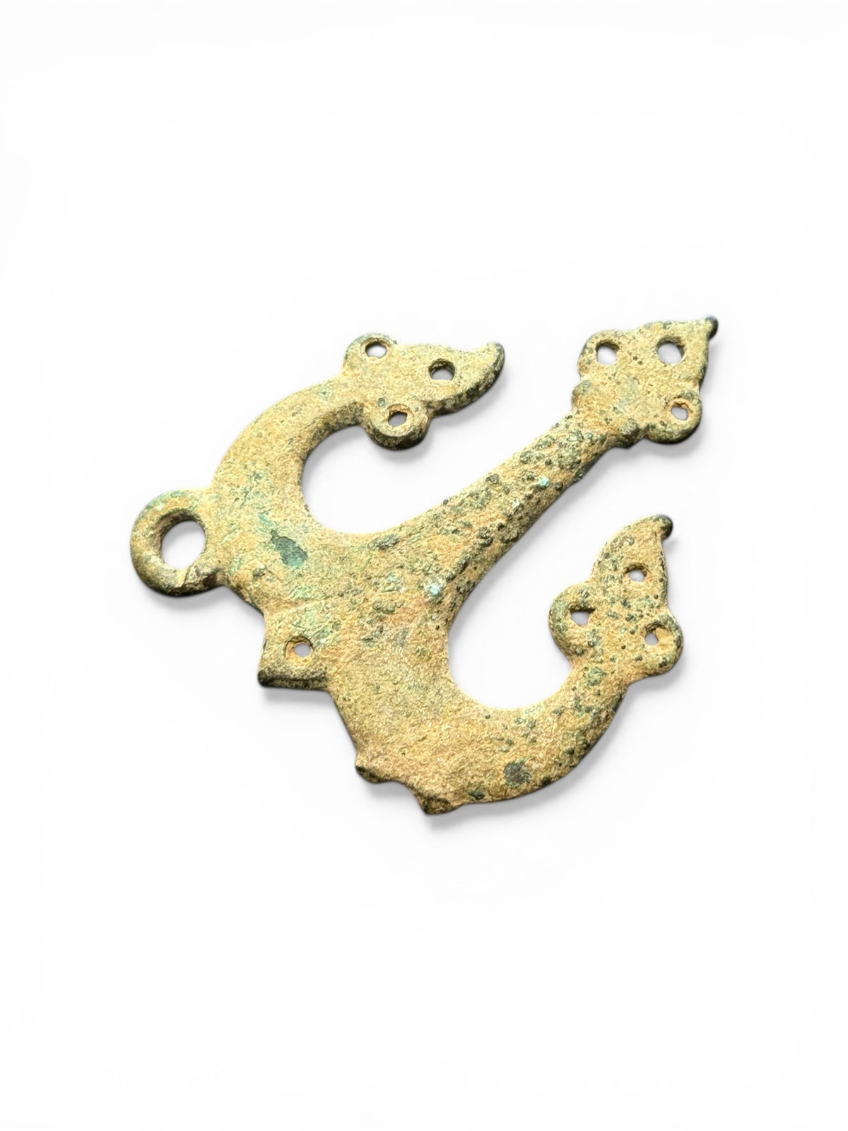 Decorative flat cast tri-lobed bronze mount, Herat region. c 10th - 13th CE. Used to decorate a leather or fabric belt or harness. Length 6.1 cm, width 5 cm.