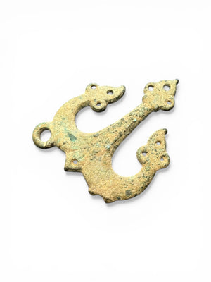 Decorative flat cast tri-lobed bronze mount, Herat region. c 10th - 13th CE. Used to decorate a leather or fabric belt or harness. Length 6.1 cm, width 5 cm.
