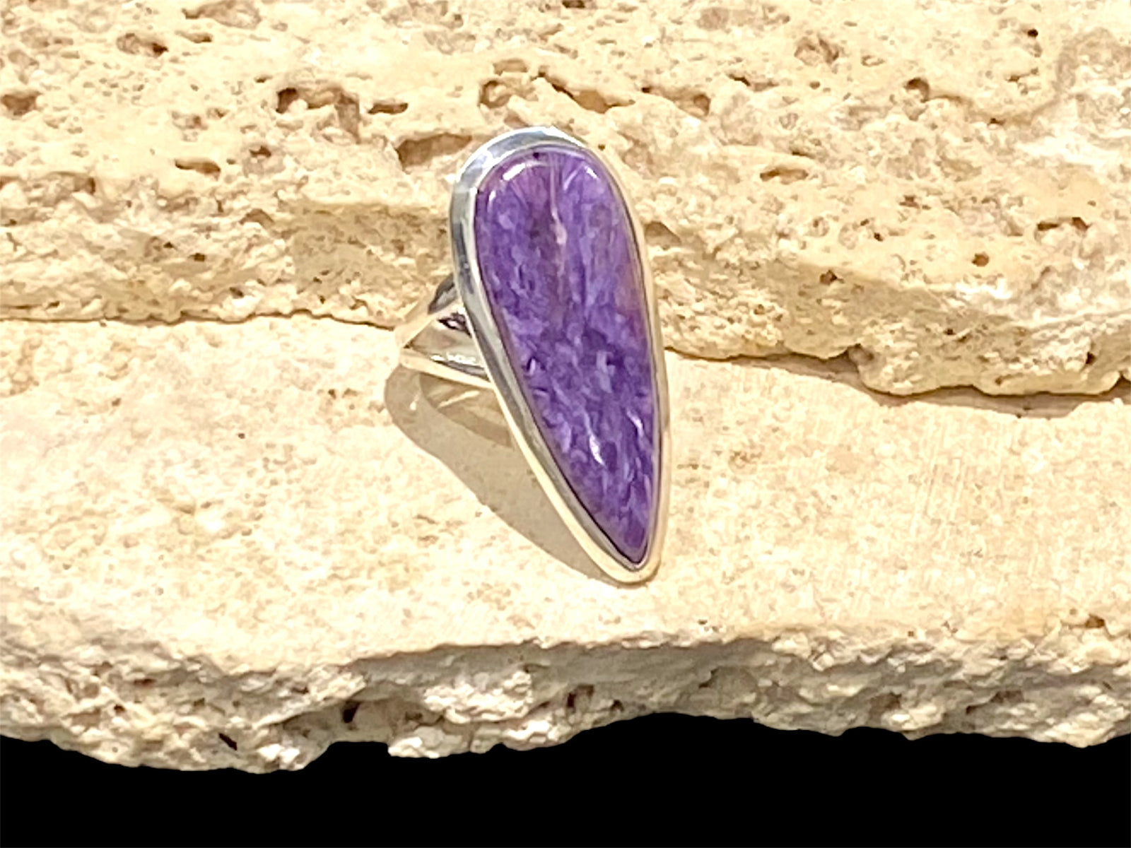A lovely  large and elegant charoite ring set in sterling silver. Length 3.8 cm, width 1.6 cm. US Size 7.5;| Inside diameter 17.75 mm