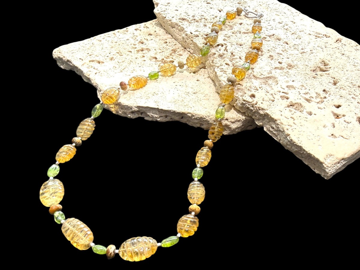 Stunning natural bead necklace of graduated, etched golden citrine, peridot & jasper beads, highlighted with handmade sterling silver beads and clasp. Length 54.7 cm.