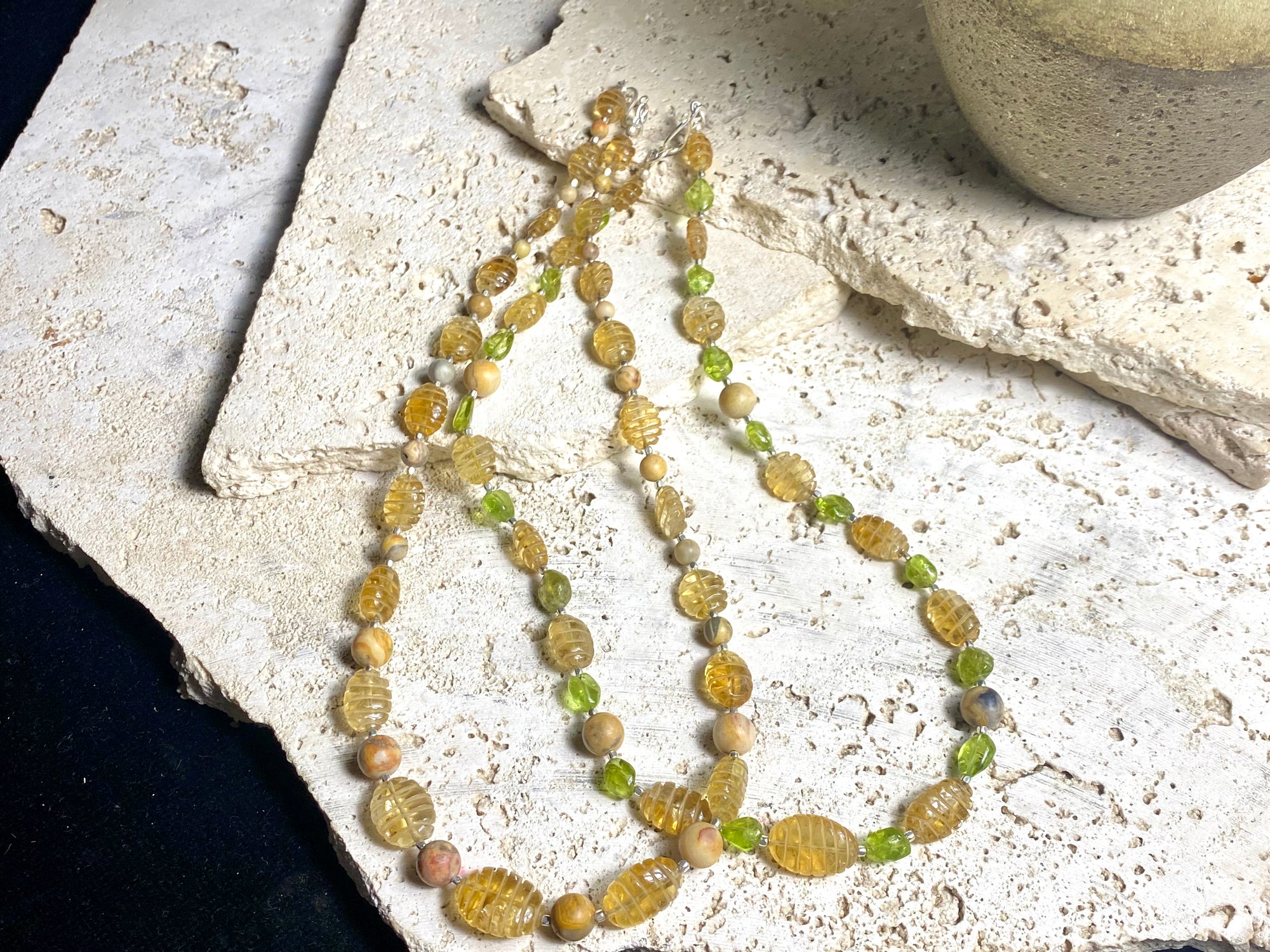 Stunning natural bead necklaces made up of graduated, etched golden citrine, peridot & jasper beads, highlighted with handmade sterling silver beads and clasp.