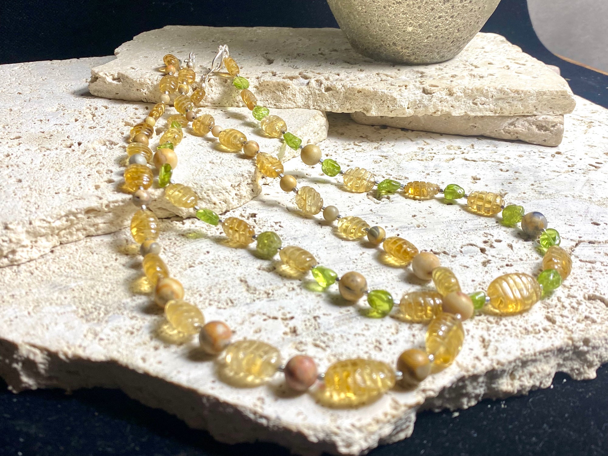 Stunning natural bead necklaces made up of graduated, etched golden citrine, peridot & jasper beads, highlighted with handmade sterling silver beads and clasp.